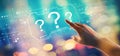 Question marks with hand pressing a button Royalty Free Stock Photo