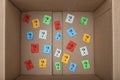 Question marks inside of a cardboard box Royalty Free Stock Photo