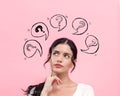Question marks with speech bubbles with young woman Royalty Free Stock Photo