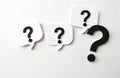 Question marks on white background. Symbols of question, doubt, uncertainty, problems, inquiry, seeking solution, decision Royalty Free Stock Photo