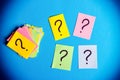 Question marks written reminders tickets top view toned Royalty Free Stock Photo