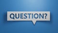Question - Speech Bubble. Minimalist Abstract Design With White Cut Out Paper on Blue Background. Royalty Free Stock Photo