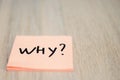 Question WHY on pink sticky note Royalty Free Stock Photo