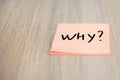 Question WHY on pink sticky note Royalty Free Stock Photo