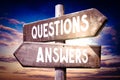 Questions, answers - wooden signpost, roadsign with two arrows Royalty Free Stock Photo