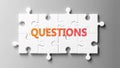Questions complex like a puzzle - pictured as word Questions on a puzzle pieces to show that Questions can be difficult and needs Royalty Free Stock Photo