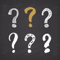 Questions marks doodle set. Hand drawn grunge signs. Vector illustration on chalkboard background