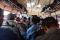 QUETZALTENANGO, GUATEMALA - MARCH 21, 2016: People ride in a chicken bus, former US school bu