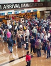 Queue at airport immigration, Singapore Royalty Free Stock Photo