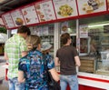 The queue at the fast food kiosk on the University square in Voronezh, Russia