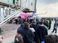 queue of passengers to board of plane in Yerevan