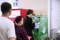Queue of people in the ATM `Sberbank`.