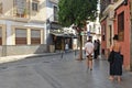 Queue of people to buy in a bakery of Seville, Spain