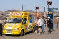 Queue at a van for ice cream on a sunny day at the harbor in Bristol, UK Royalty Free Stock Photo