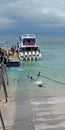 Queued waiting for the ferry on Bali tour. Royalty Free Stock Photo