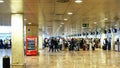 Queues of people at the check-in counters of the Barcelona airport