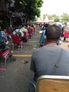 queues of people waiting to get the vaccine