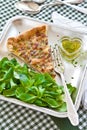 Quiche Lorraine and lamb's lettuce Royalty Free Stock Photo
