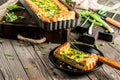 Quiche lorraine with spinach and green onion Royalty Free Stock Photo