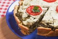 Quiche lorraine with spinach and tomato Royalty Free Stock Photo