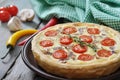 Quiche pie with chicken and cherry tomato