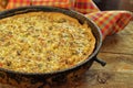 Quiche pie with chicken, green pepper, ham and mushroom in blac Royalty Free Stock Photo