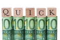 Quick Blocks Arranged On Rolled Euro Notes Royalty Free Stock Photo