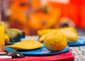 A quick breakfast contain empanada and bolon served on a blue plate, traditional andean food concept