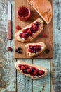 Quick breakfast, jam on toast. Raspberry jam, ricotta and raw be