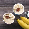 Quick breakfast in the microwave for five minutes. Homemade banana cup cakes in paper cups portioned snack. two