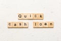 quick cash loan word written on wood block. quick cash loan text on table, concept Royalty Free Stock Photo