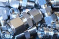 Quick connect fittings coupling for assembling compressed air, hydraulics, pneumatics, gases, fuel lines. Lays in a Royalty Free Stock Photo