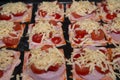 Quick mini pizzas ready for baking.