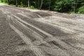 Muddy Tracks on a Dirt Road During Repairs