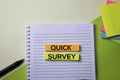 Quick Survey text on top view office desk table of Business workplace and business objects