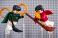 Quidditch Match Lego Harry Potter set. Marcus Flint and Harry Potter on broom captured the Golden Snitch against goalposts and Royalty Free Stock Photo