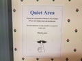 Quiet area don`t use cell phone sign on wall Royalty Free Stock Photo