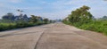 A quiet asphalt road on the edge of town