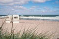 Quiet Baltic Sea beach with beach chairs Royalty Free Stock Photo