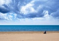 Quiet calm solitary man watching sea