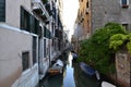 Tied up boats on quiet Venice canal Royalty Free Stock Photo