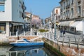 Quiet canal in Lido next to a cafe