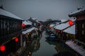 Quiet China ancient water town village in snow dark, zhouzhuang, suzhou