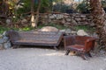 Quiet corner of a green garden with a bench