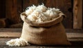 Burlap Sack Filled with Raw Sheeps Wool Royalty Free Stock Photo