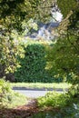 Quiet country lane. Rural countryside secluded path opening onto