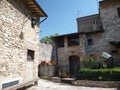 Quiet cozy courtyard on a narrow street of the medieval town of Assisi. Italy, August 2012