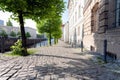 Quiet empty side street in historic district, along a river, on a spring afternoon - Berlin, Mitte, 2018 Royalty Free Stock Photo