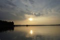 Quiet evening over the lake. The magic of the sunset and the charm of nature Royalty Free Stock Photo