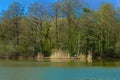 Quiet lake and fisherman